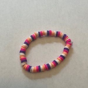 Handmade purple and pink bracelet.